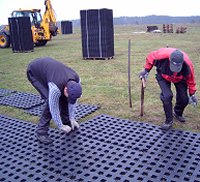 PERFO geogrid tiles being laid out